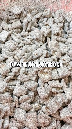 the words classic muddy buddy recipe are in front of a pile of dog food rocks