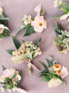 the flowers are arranged in rows on the table