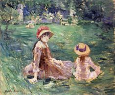 two women sitting on the grass in a park, one wearing a hat and the other holding a straw hat