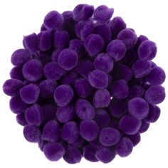 a pile of purple pom poms on a white background