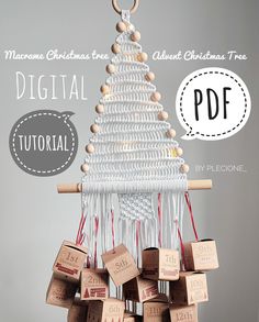 a christmas tree made out of wine corks with the words digital on it and an ornament hanging from the top