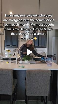 a woman standing in front of a kitchen counter