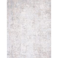 an area rug with white and gray colors