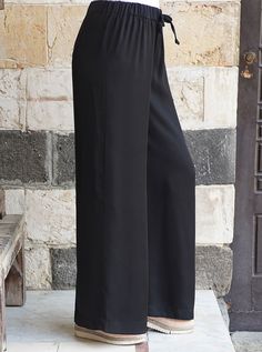 Full length Elasticized drawstring waist Wide leg flared cut Item Code: wP0393 Model is 168cm (5 feet 6 inches) and wearing size M Black Wide Leg Ankle-length Pants With Pull-on Style, Black Wide Leg Ankle-length Pants, Black Ankle-length Wide Leg Pants, Chic Black Pull-on Pants, Chic Black Pants With Pull-on Style, Black High-waisted Wide Leg Pants With Pull-on Style, Black Full Length Wide Leg Pants With Pull-on Style, Black Wide Leg Pants With Pull-on Style, Black Pull-on Wide Leg Pants