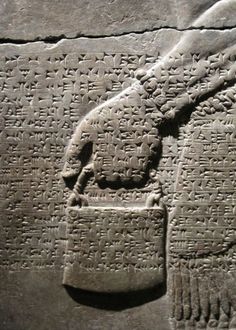 an ancient tablet with writing on it