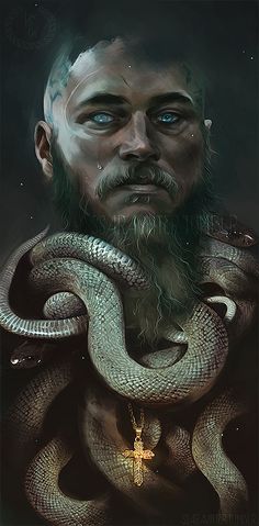 a man with a beard is holding a snake