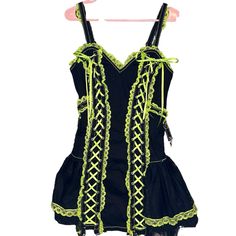 This Is A Super Cute Medium Tripp Nyc Black And Lime Green Laced Corset Dress With Attached Chains For A Super Fun Grunge Goth Look! Nwot I Tried It On Once And Didn’t Like It On Me But The Tag Got Caught In The Zipper And Had To Be Taken Off! Chains Still Have Protective Plastic On Them! Fun Tutu Flare At The Bottom, This Dress Is Super Hard To Find! Can Fit A Medium/Large! Super Snatching Dress! Basically Impossible To Find Anymore! Leave Any Questions Below! I’m Always Open To Offers As Well Black Summer Corset Dress For Costume, Summer Black Corset Costume Dress, Black Corset Dress For Summer Costume, Black Mini Dress For Costume, Black Sleeveless Boned Corset Dress, Black Mini Dress With Lace Trim For Costume Party, Black Lace Trim Mini Dress For Costume Party, Black Summer Costume Dress, Black Lined Mini Corset Dress