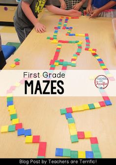 two children at a table with post - it mazes in front of them and the text, first grade mazes