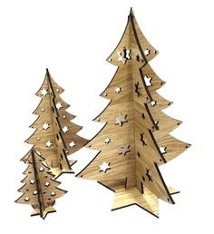 three wooden christmas trees with stars on them