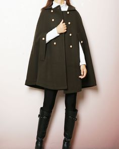 * A cool and long woolen cape coat, very elegant. * With gold color buttons and fully lined with lining. * Material: Outer-50% wool, 50% polyester; lining-100% polyester Shop sizing chart FYI ( actual body figures, not laying flat clothes measurements) Size XS (US 2, UK 6, German 32, French 34) Bust: fits bust around 33.5 inches/85cm Waist: fits waist around 26 inches/66cm Hips: fits hips around 36 inches/91cm Size S (US 6, UK 10, German 36, French 38) Bust: fits bust around 35.5 inches/90cm Wai Wool Long Coat Cape For Winter, Winter Cape With Button Closure, Wool Long Coat Cape For Fall, Long Wool Cape For Fall, Brown Wool Cape For Winter, Winter Wool Long Cape Coat, Winter Long Sleeve Cape With Buttons, Fall Wool Long Cape Coat, Winter Long Sleeve Button Cape