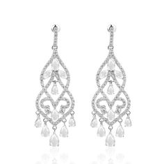 PRICES MAY VARY. 【Tassel Design】This tassel chandelier stud earrings are inlaid with sparkling crystals and moissanite. The exaggerated and gorgeous design combines the beauty of art. It is suitable for wearing at important banquets and parties. 【High-quality Materials】14K white gold, natural crystal and high-hardness Moissanite, handcrafted, carefully selected materials so that you will not have any discomfort when wearing it. 【Size Information】The earrings are about 0.79 inches (20mm) long and Glamorous White Gold Dangle Chandelier Earrings, Diamond White Elegant Dangle Chandelier Earrings, Glamorous White Drop Chandelier Earrings, Diamond White Crystal Chandelier Dangle Earrings, White Rhinestone Chandelier Drop Earrings, Tassel Chandelier, European Jewelry, Earrings Chandelier, Jewelry Cabinet