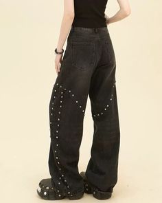 Grunge style black denim jeans with a high waist and wide legs, accented with rivet details for a unique and rebellious look Size: • S: Waist: 64cm/ 25.2 in, Hips: 100cm/ 39.4 in, Length: 106cm/ 41.7 in• M: Waist: 68cm/ 26.8 in, Hips: 104cm/ 40.9 in, Length: 108cm/ 42.5 in• L: Waist: 72cm/ 28.3 in, Hips: 108cm/ 42.5 in, Length: 110cm/ 40.6 in• XL: Waist: 76cm/ 29.9 in, Hips: 112cm/ 44.1 in, Length: 112cm/ 44.1 inMaterial: Denim Edgy Baggy High Waist Flare Jeans, Punk Wide-leg Jeans For Alternative Fashion, Black High Waist Flare Jeans Y2k Style, Black High Waist Y2k Flare Jeans, Y2k Style High Waist Black Flare Jeans, Grunge Black Wide Leg Flare Jeans, Punk Style Washed Black Straight Leg Bottoms, Black Mid-rise Punk Pants, Mid-rise Black Punk Pants