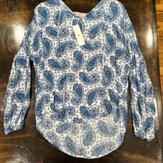 Brand New Blue And White Paisley Cdm, Western Longsleeve, Flowy, Shirt. Never Worn. Smoke Free Home Casual Blue Paisley Print Tops, Casual Long Sleeve Blouse With Paisley Print, Casual Long Sleeve Paisley Print Blouse, Blue Cotton Tops With Paisley Print, Casual Cotton Tops With Paisley Print, Casual White Shirt With Paisley Print, Casual Long Sleeve Tops With Paisley Print, Long Sleeve Paisley Print Patterned Top, Long Sleeve Paisley Print Tops