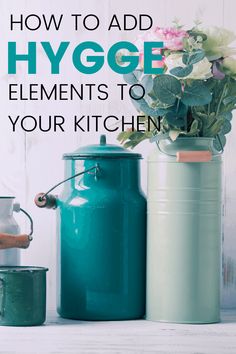 the words how to add hygge elements to your kitchen are in front of two canisters with flowers