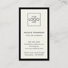 a white marble business card with black trimmings on the front and bottom corner