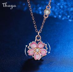 Our Cherry Blossom Spinner Necklace is a symbol of the fleeting beauty of life. The delicate cherry blossom pendant represents the impermanence of all things, while the spinner feature encourages mindfulness and peace. With its intricately crafted design and meaningful symbolism, this necklace is the perfect addition to any outfit.   - Brand: Thaya  - Material: Sterling Silver (S925 Standard Silver)  - Size: Size: Extended chain/circumference 5cm/40cm+5cm  - Weight: 2.87g  - Style: Flower  - Gender: Women Cherry Blossom, Design Crafts, 925 Silver, Blossom, Chain, Sterling Silver, Pendant, Silver