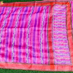 Category: Banarasi Handloom Pure Organza Fabric - Pure organza Silk Color - Pink Hand brushed in multi-color. Craft - Ari zardozi work. Material used sequins, Dabka,resham,kasab Note- There may be slight color variations due to photographic reasons. This is a hand-woven product and any irregularities in the weaving or pattern should not be taken as a defect. These irregularities make every handloom piece unique. Multicolor Embroidered Silk Saree Fabric, Semi-stitched Multicolor Chanderi Blouse Piece, Multicolor Semi-stitched Fabric With Embroidered Border, Multicolor Dupatta With Embroidered Border, Multicolor Embroidered Border Dupatta, Multicolor Art Silk Traditional Wear With Embroidered Border, Multicolor Traditional Wear With Embroidered Border In Art Silk, Pink Art Silk Saree With Embroidered Border, Festive Multicolor Chanderi Blouse Piece