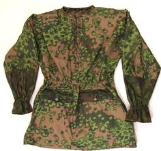 a green and brown camouflage print shirt dress