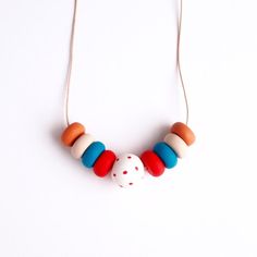 Red Dots - Handmade Clay Necklaces - Mixed Colors - Wearable Art - Jewelry - Unique Design - With Leather Cord Handmade Orange Necklace For Everyday, Red Artisan Beaded Necklaces For Crafting, Artisan Red Beaded Necklaces For Crafting, Handmade Red Necklace For Everyday, Everyday Handmade Red Necklaces, Handmade Red Craft Supplies, Handmade Artsy Red Jewelry, Artsy Handmade Red Jewelry, Unique Red Everyday Jewelry