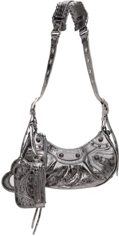 Crinkled Arena lambskin shoulder bag in metallic silver-tone. · Pin-buckle shoulder strap · Detachable zip pouch at shoulder strap · Detachable mirror · Studs and pin-buckle straps at face · Gathering at face · Zip closure · Cotton canvas lining · Antiqued silver-tone hardware · H5.5 x W10 x D2.5 in Supplier color: Silver Balenciaga Shoulder Bag, Balenciaga Black, Balenciaga Bag, City Bag, Black Shoulder Bag, Silver Shop, Black Xs, Zip Pouch, Balenciaga City Bag