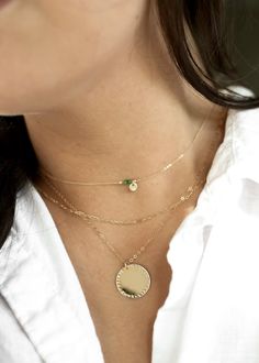 "𝗘𝗮𝘀𝘆 𝗧𝗼 𝗦𝘁𝘆𝗹𝗲, 𝗠𝗮𝗱𝗲 𝗧𝗼 𝗟𝗮𝘀𝘁 Our bold 3/4\" necklaces are easy to layer, elegant, and ready to be personalized with your most special sentiments, moments, and memories! Created to last a lifetime, these necklaces will remain evergreen even as the years and trends come and go. 𝗠𝗮𝘁𝗲𝗿𝗶𝗮𝗹𝘀 𝗪𝗲 𝗨𝘀𝗲 This necklace is made entirely with sturdy 14k yellow gold filled, 14k rose gold filled, or sterling silver pieces. It is safe to wear in the shower, but we recommend avoi 14k Gold Filled Chain Necklace With Round Pendant, 14k Gold-filled Round Pendant Chain Necklace As Gift, Yellow Gold Coin Necklace With Nickel-free Round Pendant, Nickel-free Yellow Gold Coin Necklace With Round Pendant, 14k Gold Filled Necklace For May Birthstone, Minimalist May Birthstone Charm Necklace, 14k Gold-filled Chain Necklace For Gift, 14k Gold-filled Chain Necklace With Round Shape As Gift, Everyday 14k Gold Necklace For May Birthstone