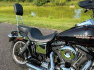 a black motorcycle parked on the side of a road