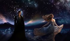 a man and woman are standing in front of the night sky with stars above them