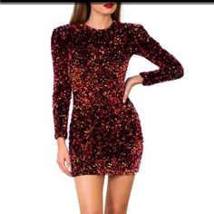 Show-Stopping Sequin Mini Dress. Red/Orange/Pink Iridescent Sequins Cover The Entire Thing And Give It A Different Look/Color Depending On The Light You Are In. Thick Padding In The Shoulders. Fully Lined With A Back Hidden Zipper. Dress Has Some Stretch. Underarm 18” Flat Waist 14” Length 33” Dress Is Brand New And Unworn, But Has Been Kept On The Sales Floor And Tried On In Store. Negligible Or Minor Imperfections May Be Present Due To The Delicate Nature Of The Dress And The Handling Process Glamorous Multicolor Formal Dress, Formal Pink Sequin Mini Dress, Formal Pink Mini Dress With Sequins, Pink Sequined Mini Dress For Fall, Multicolor Long Sleeve Dress For Night Out, Elegant Multicolor Dresses For Holidays, Glamorous Multicolor Long Sleeve Mini Dress, Glamorous Long Sleeve Multicolor Mini Dress, Red Long Sleeve Mini Party Dress