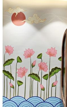 a wall with flowers painted on it next to a mirror