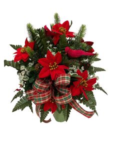 poinsettia and greenery wrapped in plaid ribbon