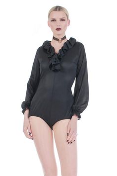 70s Vtg Ruffled Bodysuit Semi Sheer Black Nylon Loungewear Long Sleeve – KCO VINTAGE Stretch Ruffled V-neck Bodysuit, Fitted Ruffles Bodysuit For Night Out, Stretch Bodysuit With Ruffles, Fitted Long Sleeve Bodysuit With Ruffles, Elegant Stretch Bodysuit With Ruffles, Stretch Ruffled Bodysuit For Party, Stretch V-neck Bodysuit With Ruffles, Stretch Ruffles Bodysuit For Party, Stretch Ruffle Bodysuit For Party