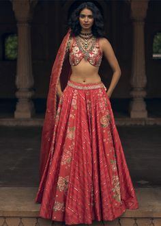 An ethereal crimson lehenga in a combination of floral, leheriya and abstract floral prints, with delicate zardozi and aari hand-embroidery, and an embroidered attached belt. It is paired with a hand-embroidered floral paulmi and harsh signature blouse, and a scallop hand-embroidered dupatta. Latest Bridal Lehenga Designs, Indian Traditional Wear, Bridal Lehenga Designs, Latest Bridal Lehenga, Floral Lehenga, India Clothes, Embroidered Dupatta, Indian Inspired, Crimson Red