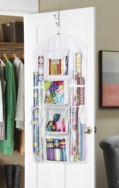 an organized closet with clothes and craft supplies