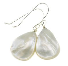 PRICES MAY VARY. Quality White Mother of Pearl; Teardrop shape Simple design casual or dressy Earrings hang 1.4 inches Mannequin photo shows relative size and how they will hang High Quality Sterling Silver French Ear wires These earrings are a great wardrobe staple and timeless in design. Please note photos show camera lighting, shadows and reflections. Earrings comes wrapped and packaged in a small colorful tie pouch. A gift box option is available with your selection of the gift wrapping opti Dressy Earrings, Mother Of Pearl Earrings, All Gems, Shell Earrings, Large Earrings, Ear Wires, Gemstone Earrings, Mother Of Pearl, Solid Gold