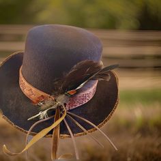 One of a kind handcrafted felt hat ...This hat takes you back in time ... ready for your personality to bring it into the present  This is a 💯 rabbit fur felt with a sewn in leather hatband handcrafted by me The brim is finished with velvet ribbon  24 inches  3.5 inch brim  4 inch crown  Leather sweatband sewn in  Western weight 210 g Satin liner  Shipping included Luxury Fur Felt Elegant Cowboy Hat, Luxury Elegant Fur Felt Cowboy Hat, Luxury Custom Fur Felt Cowboy Hat, Luxury Fur Felt Top Hat For Western-themed Events, Luxury Fur Felt Fitted Cowboy Hat, Luxury Brown Fur Felt Hat Band, Luxury Fur Felt Cowboy Hat With Curved Brim, Luxury Winter Felt Hat For Rodeo, Luxury Western Boater Hat In Fur Felt