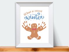 a print with the words, what a sweet winter and a ginger holding his hands up