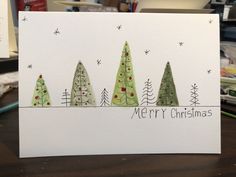 a christmas card with trees on it