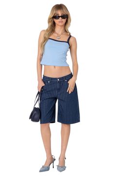 A relaxed silhouette and smart pinstripes amplify the trend-savvy appeal of denim Bermuda shorts rendered in a medium-blue wash. Zip fly with button closure Five-pocket style 100% cotton Machine wash, dry flat Imported Trendy Pinstripe Bottoms For Summer, Trendy Pinstripe Summer Bottoms, Denim Jeans With Vertical Stripes, Trendy Pinstripe Bottoms For Spring, Trendy Blue Bottoms With Vertical Stripes, Trendy Denim Bottoms With Vertical Stripes, Casual Mid-rise Bottoms With Vertical Stripes, Casual Vertical Striped Jeans For Summer, Casual Pinstripe Jeans With Straight Leg