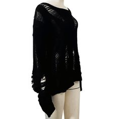 This goth black hole knit sweater is one of the best choices for women who are looking for something different and unique. Made of lightweight fabric, this Cool Hollow Out Pullover Top For Women features a super cool design with a deep hole in the front and back that is covered by black lace panels. This goth top comes with a drapey wide neckline and a long-sleeve design. It is compatible to be worn in any season of the year! Please check out our size chart carefully Estimated Time of Delivery: Black Gothic Sweater For Streetwear, Alternative Black Long Sleeve Sweater, Black Oversized Alternative Sweater, Black Oversized Alternative Style Sweater, Alternative Style Long Sleeve Black Sweater, Black Alternative Style Sweater For Fall, Edgy Knit Sweater For Streetwear, Winter Hollow-out Knit Sweater, Winter Knit Sweater With Hollow Out Design