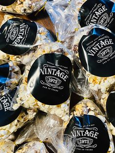 several bags of vintage popcorn sitting on top of a table