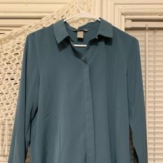 Size Medium, Worn Once, Basically Still Brand New! It Fits True To Size And Is Very Chic, With Buttons Hidden By The Front Fold Of The Blouse. Fitted Turquoise Long Sleeve Tops, Chic Blue H&m Tops, Blue H&m Top For Work, H&m Blue Workwear Top, H&m Blue Collared Top, H&m Blue Button-up Tops, Blue Collared H&m Top, Chic Blue H&m Blouse, Chic Blue Blouse From H&m