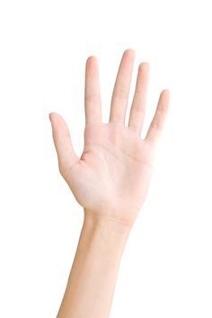 a person's hand reaching up into the air