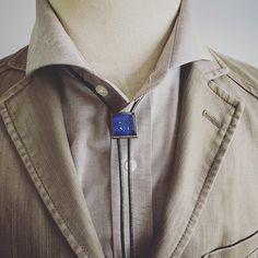 It is a leather strap bolo tie using blue resin parts of "Dandy Series". Blue light blue is eye-catching design. Pleasing to casual attire accent. It is "Dandy Series" designed as a button. Four holes were made by perforating from the back on color paper with irregularities, after hardened with resin, painted with light blue paint from the back. The contrast with the color seen from the four holes is the point. Dandy Series: These are the dandy series with a button-like design with four holes pe Light Blue Paint, Bolo Tie Men, Light Blue Paints, Tie Men's, Color Paper, Bolo Tie, Blue Paint, Casual Attire, Dandy