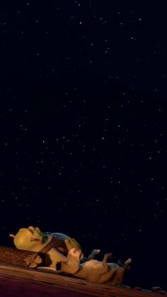 an animated scene is shown in the night sky with stars above it and people laying down