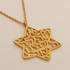 This Shema Israel Star of David 18K Gold-Plated Pendant Necklace is a unisex treasure that bridges faith and fashion with grace and strength. Crafted to resonate with the profound Shema Israel prayer, the pendant carries the initials שמ"ע ישראל ה' אלוהינו ה' אחד, embodying the central tenet of Jewish faith — the oneness of God. Its timeless design and spiritual significance make it a versatile piece suitable for all genders and ages. Features: Materials: 18K Gold-Plated Brass Pendant Diameter: 1 Star Of David, Brass Pendant, Gold Pendant Necklace, Chain Length, Gold Pendant, Timeless Design, Special Occasion, Initials, 18k Gold