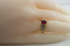 Genuine Diamond Ring, Red Ruby Ring, Vintage Ring, 18K Gold Ring, Gold Band, Natural Diamond Band, Elegant Ring. This vintage ring is made in solid 18K Yellow Gold. It has inscription inside of the shank dated 2.14.82. The center natural Earth mined Ruby measures 7x5mm (.90 carat). This stone is very clean and transparent. 24 natural round brilliant cut diamonds on the sides total .66 carat of VS2 clarity and H color. The setting raises 6mm high above finger. Size 5.75 (sizable). The ring weighs Red 14k Stamped Cluster Ring, Red Cluster Ring Stamped 14k, Anniversary Red Cluster Ring Stamped 14k, Red Diamond Cluster Ring Stamped 14k, Oval Ruby Cluster Ring Stamped 14k, Collectible Ruby Rings In Fine Jewelry Style, Collectible Ruby Ring Fine Jewelry, Heirloom Style Red Birthstone Ring Stamped 14k, Red Heirloom Cluster Ring For Anniversary