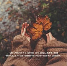 a person holding a leaf in their hands with the quote as a viewer, it is easy to judge but the real difficulty is for the sure who experiences the claim