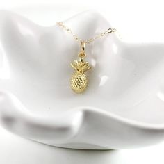 "You are going to absolutely love this adorable pineapple necklace in your choice of silver or gold. Each necklace will come on a custom card with the inspirational message \"Be a pineapple, stand tall, wear a crown, and be sweet on the inside\". Charm will hang on either a sterling silver or 14K gold filled cable chain to match the charm. Wear this everyday for a \"sweet\" reminder to always be awesome! Each pineapple charm measures approximately 3/4\" tall by just under 1/3\" wide. ♥ ♥ ♥ Check Tropical Accessories, Be A Pineapple, Pineapple Gifts, Pineapple Necklace, Inspirational Jewelry, Silver Chain Style, Silver Bow, Cool Necklaces, Birthstone Charms