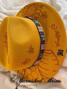 Beautiful bright mustard colored hand burned hat. Great attention to detail. Material is felt All hats are adjustable and brims can be molded to your liking. Hand Burn, Chapeau Cowboy, Felt Fedora, Bee Design, Fedora Hat, Festival Season, Fedora, Cowboy Hats, Caps Hats