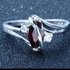 New With Box. Austrian Crystal Around Ruby Colored Gem Elegant Silver Ruby Ring For Valentine's Day, Silver Garnet Ring For Valentine's Day, Party Ruby Ring In Silver, Silver Ruby Ring For Party, Party Silver Ruby Ring, Ss Ring, 7 Rings, Ring Color, Colored Gems